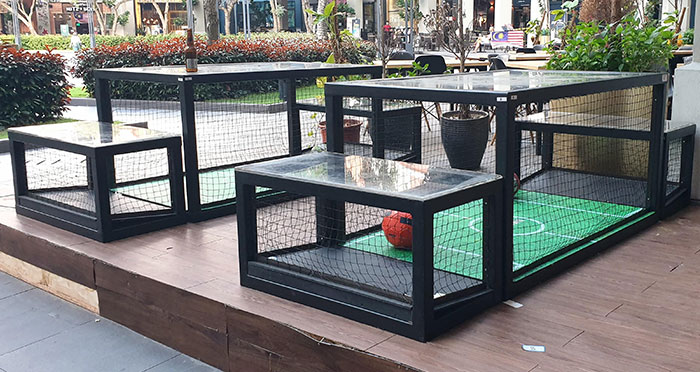 Play A Friendly Game Of Football While You Sit At These Tables