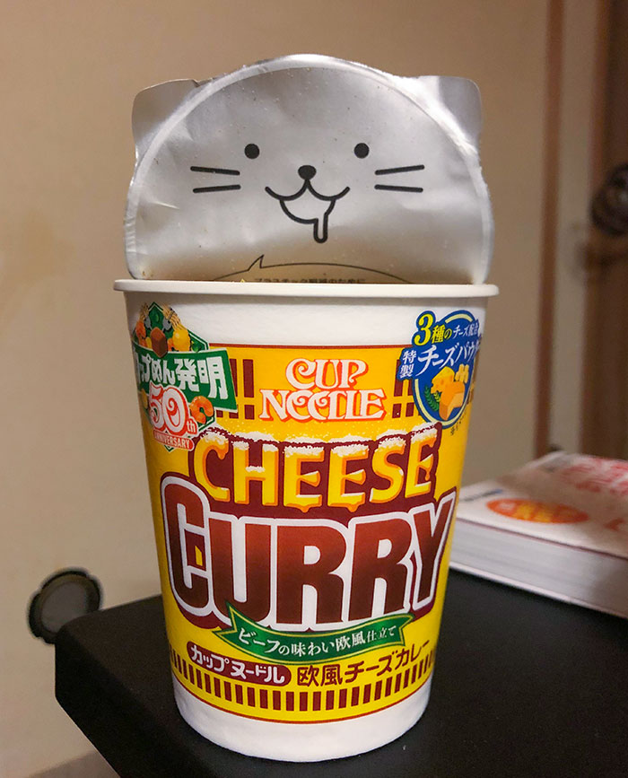 My Cup Noodles Lid Is Also A Cat That Greets You When You Open It Halfway