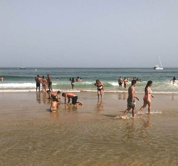 It Makes 1 Hour That They're Looking For Their Car Keys That Their Kid Buried Inside The Sand