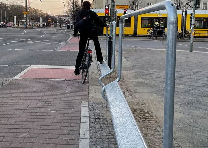 In Germany There Are Boards Installed At The Traffic Light So You Don't Have To Get Off Your Bike While Waiting