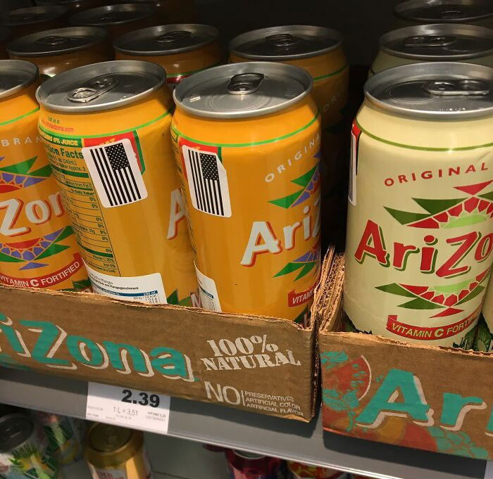 Grocery Store In Germany Has Started Importing Arizona Ice Tea Cans And Covers Up The 99¢ With Mini American Flag Stickers