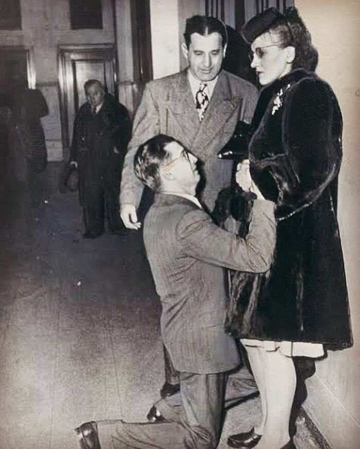 A Man Begging For His Wife's Forgiveness Inside A Divorce Court | Chicago, 1948