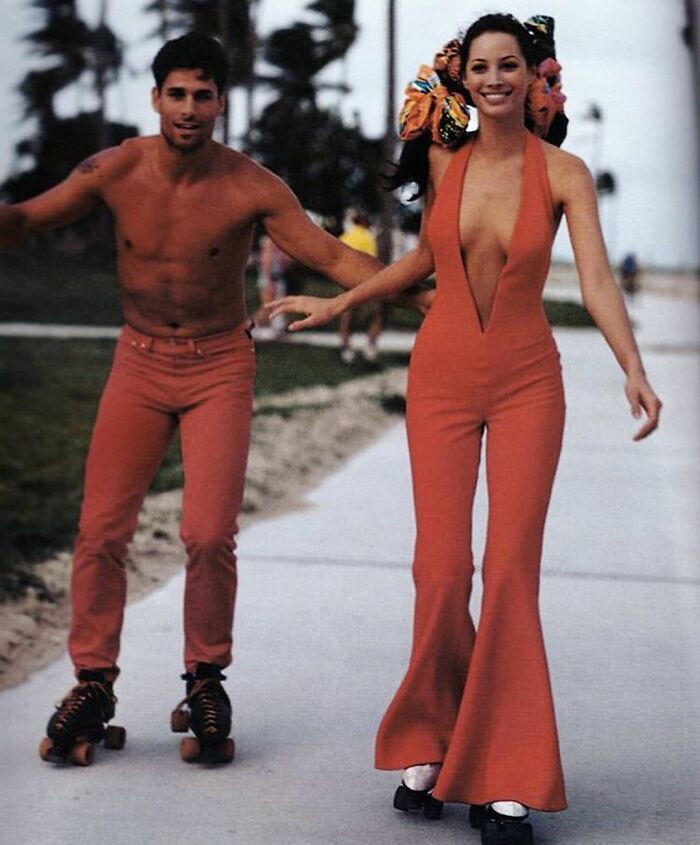 Roller Skating Down South Beach Boardwalk In Poppy-Red Attire For L Gianni Versace Spring/Summer Collection, 1993