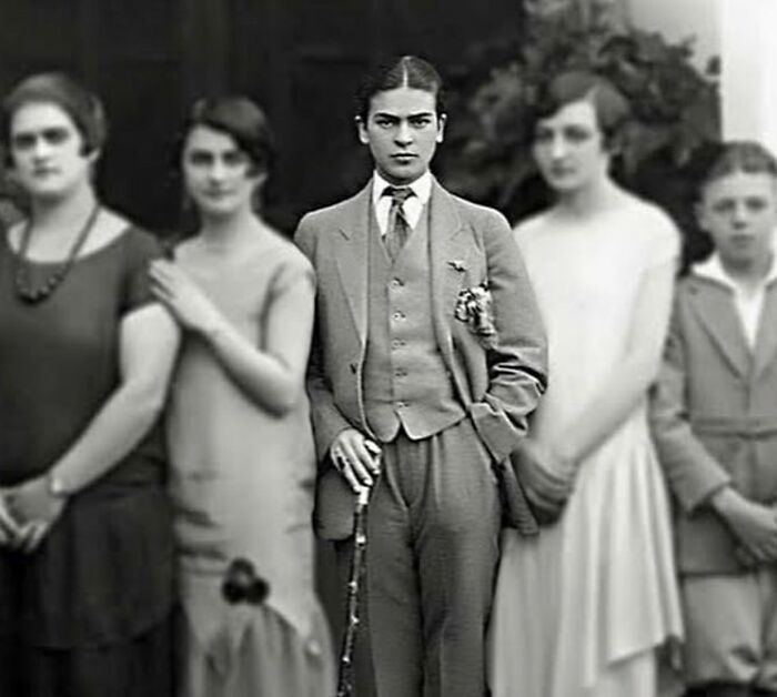 Frida Kahlo Takes A Family Portrait Wearing Her Iconic Three Piece Suit, Accessorised With A Cane // Mexico, 1924