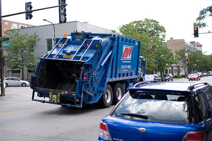 Garbage Truck With A Motorised Arm