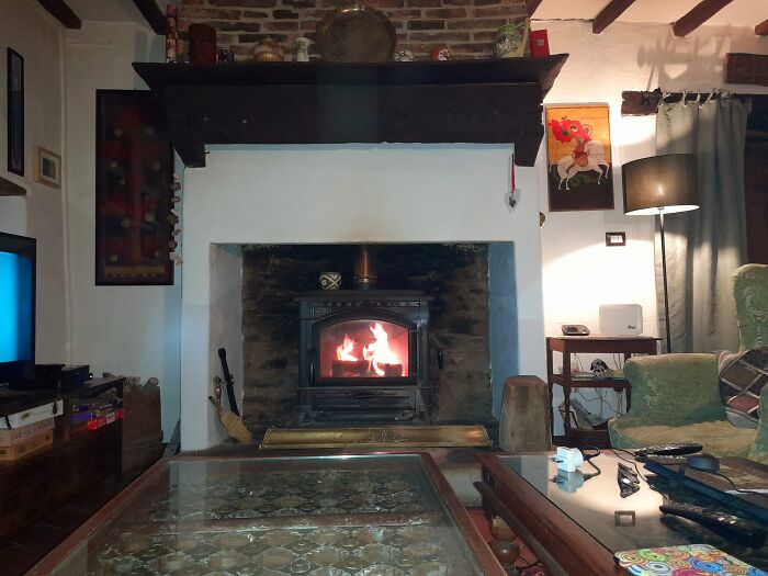 Definitely In Front Of The Fireplace.