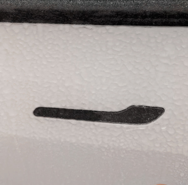 My Tesla's Door Handles When It's Icy Outside