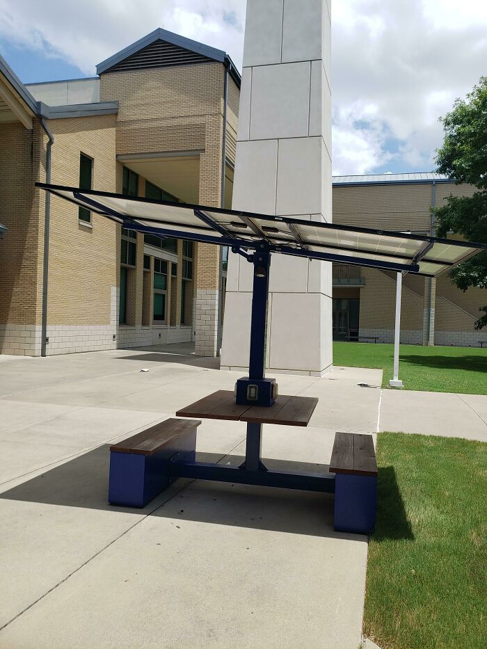 These Tables At My College Campus Use Solar Panels As Shade, Which In Turn Provide Power For The Charging Ports On The Table