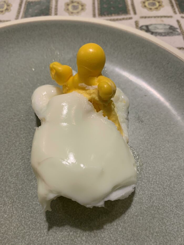 I Was Making Hard Boiled Eggs And One Of Them Broke, And It Looks Like A Baby Sleeping In His Bed
