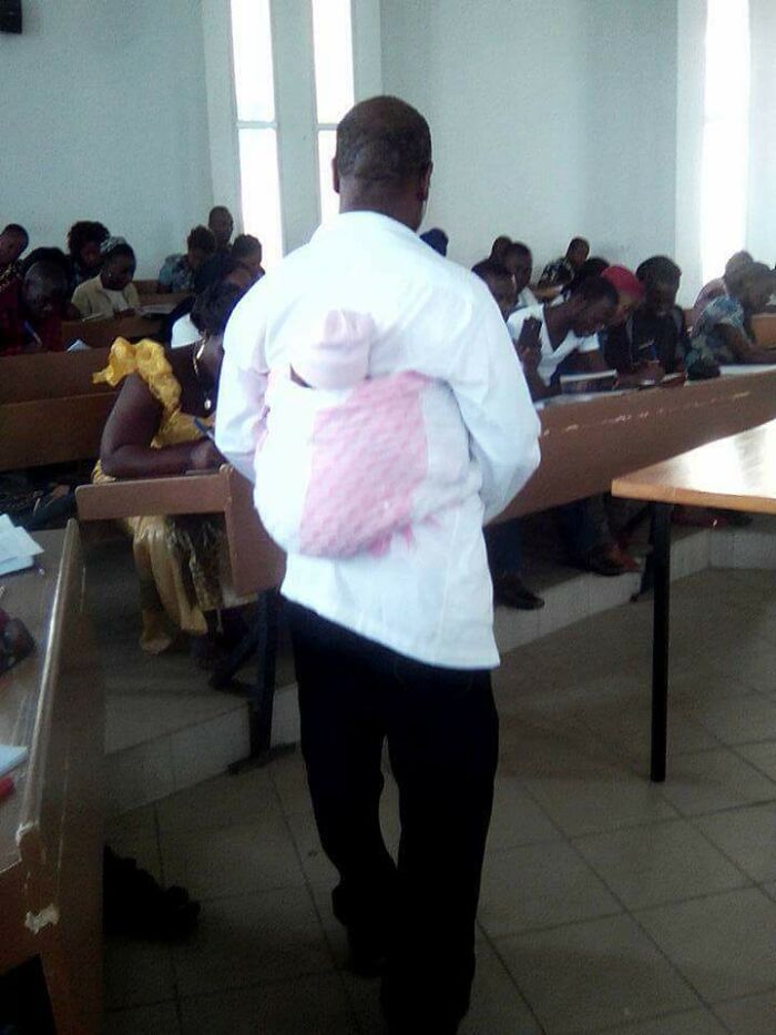 A College Professor Carries His Student's Child So She Can Sit Her Exams