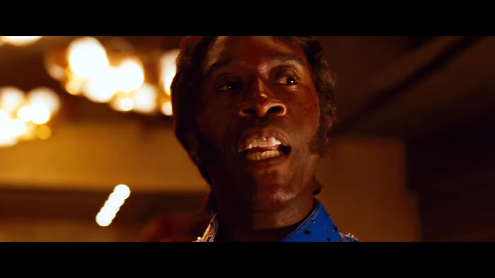 In Ocean's Thirteen (2007), When Basher (Don Cheadle) Pretends To Be Stunt Performer Fender Roads, He Completes His Patriotic Outfit With An American Flag Painted On His Front Teeth.