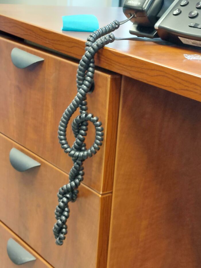 My Coworkers Phone Cord Made A Treble Clef
