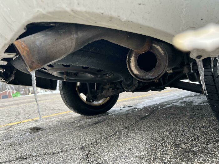 Tried To Knock The Ice Off My Muffler And It Freely Moved, Checked Under My Car And Saw This…