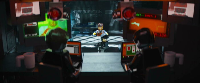 In The LEGO Movie (2014), One Of The Robots Is Playing Solitaire While Bad Cop Is Interrogating Emmett
