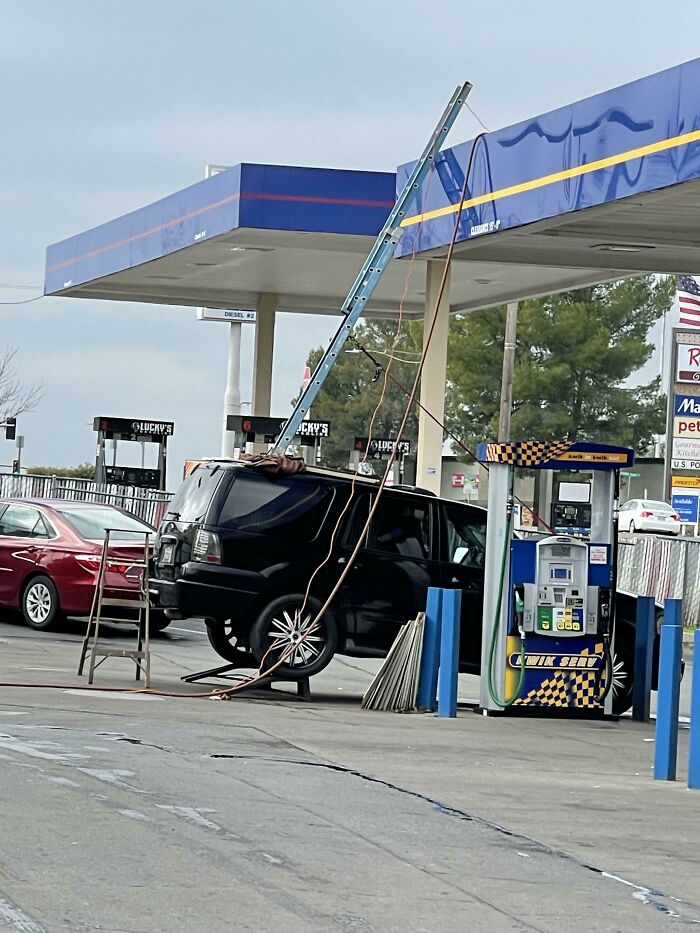 Just A Little Boost To Reach This Gas Station Roof