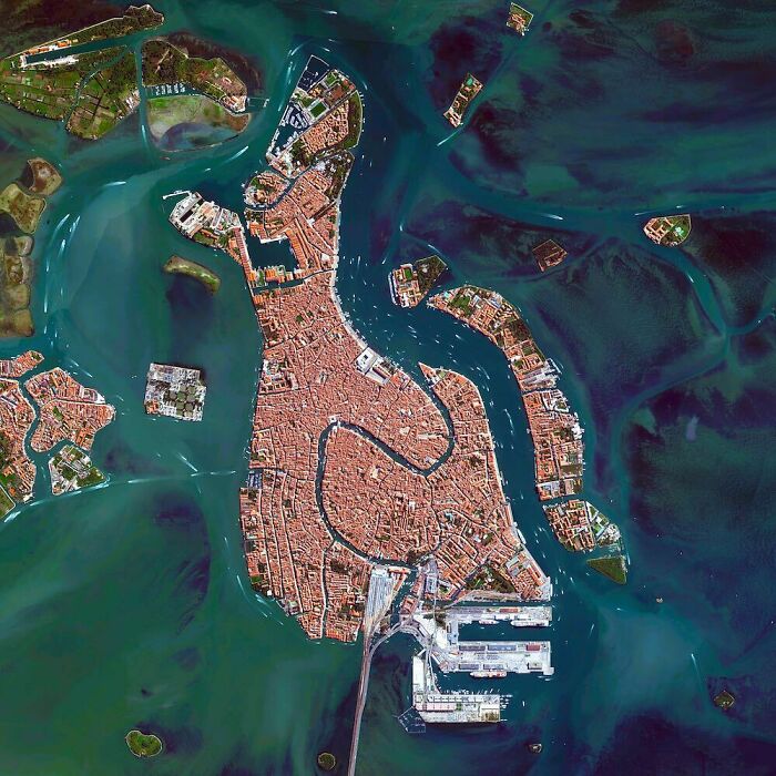 Venice, Italy, Which Is Situated Upon 118 Small Islands Separated By Canals And Linked By Bridges