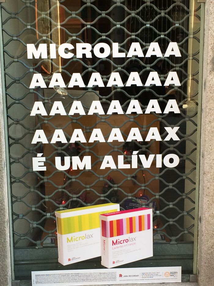 On A Pharmacy Window. The Sort Of Thing You Ask For In A Low Voice. Laxative. Seen In Oporto. ....it Ends In ..it's A Relief...
