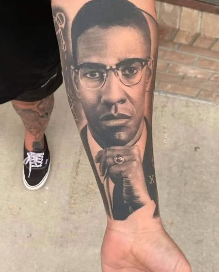 So My Friend Is Bragging About How He So Pro Black So Much So He Got Malcom X’s Face On His Forearm. And I Just Can’t Break His Heart... So Yeah Bro You Got “Malcom X”