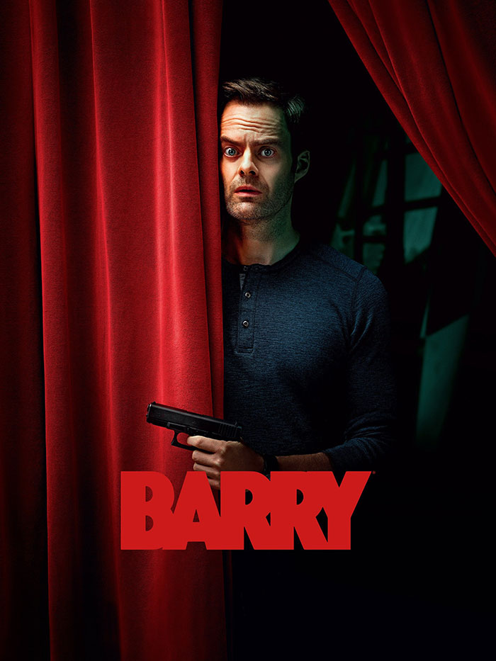 A man holding a gun stands behind a red curtain, related to HBO TV shows.
