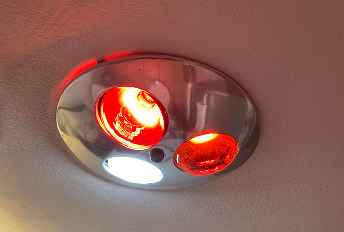The Hotel I’m Staying At Still Has Heat Lamps In The Bathroom From When They Opened In The 1960s