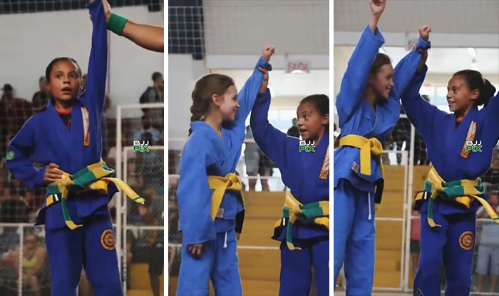 Little Girl Wins But Then Celebrates With Her Opponent. True Sportsmanship And Kindness! They're Both Winners!