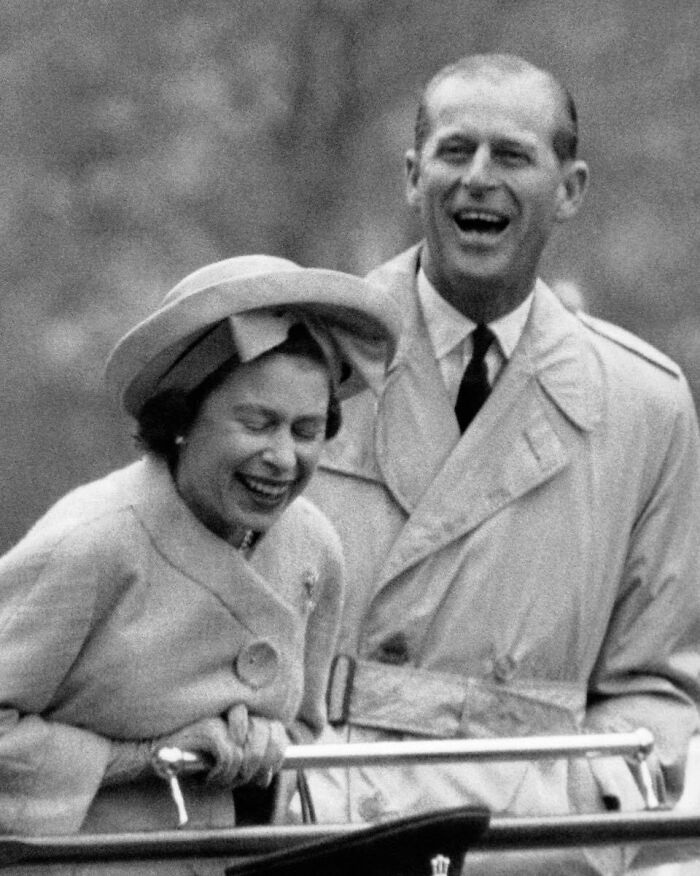 Queen Elizabeth And Prince Philip Share A Laugh While Watching A Rope Acrobat, 1963