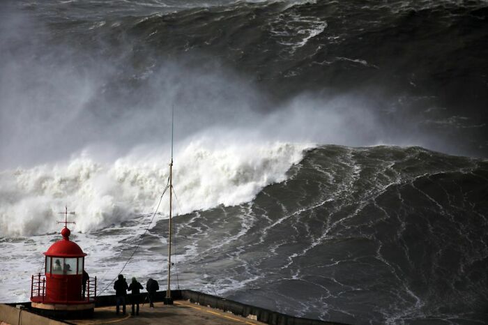 Lighthouse In Portugal. This Is The Time Of The Year That The Waves Are Massive. Not On My Bucket List!!!
