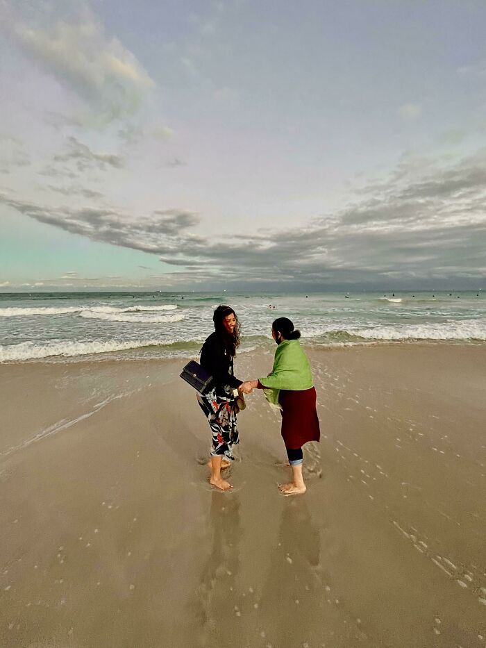My Wife Easing My Mil Closer To The Water After She Saw The Ocean For The First Time In 10 Years And It Made Her Feel “Dizzy”