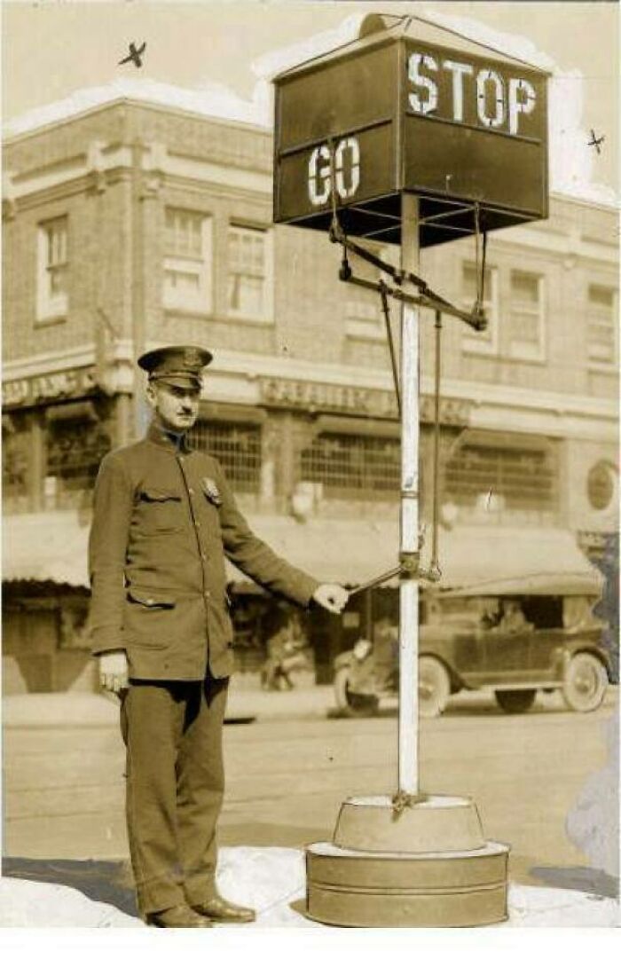 A Civil Servant With A Manually Operated Traffic Signal, Philadelphia, 1922