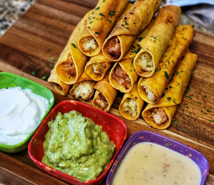 Taquitos. Smoked Chicken, Cream Cheese, And Onion, And The Other Is Potatoes, Cream Cheese, And Jalapeño