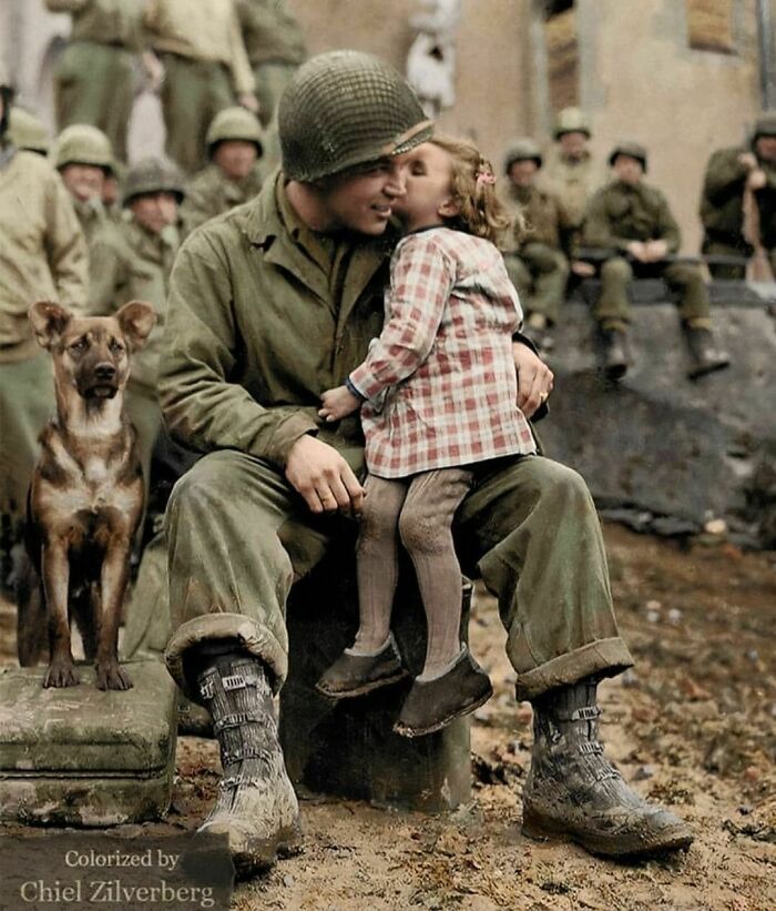 U.S. Army Technician Alvin Harley Of The 9th Armored Division Receives A Kiss From A Liberated French Girl On Saint Valentine’s Day. Abancourt, Oise, Picardy, France. February 14, 1945