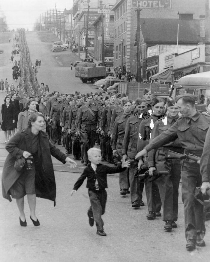 “Wait For Me, Daddy Is A Photo Taken By Claude P. Dettloff On October 1, 1940, Of The British Columbia Regiment Marching Down Eighth Street At The Columbia Street Intersection, New Westminster, British Columbia.