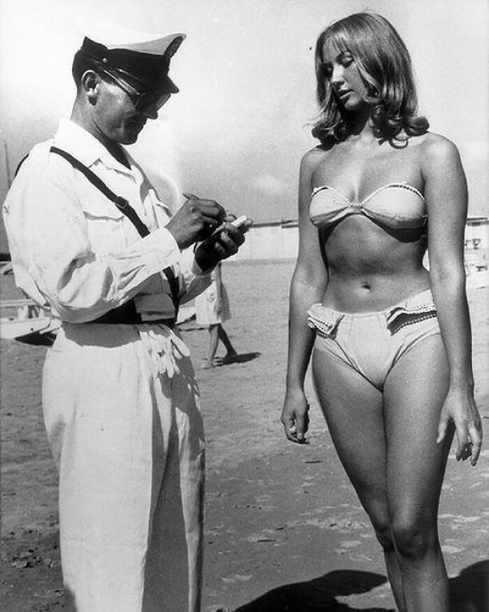 Women Getting A Ticket For Wearing Her Bikini On An Italian Beach, 1957
