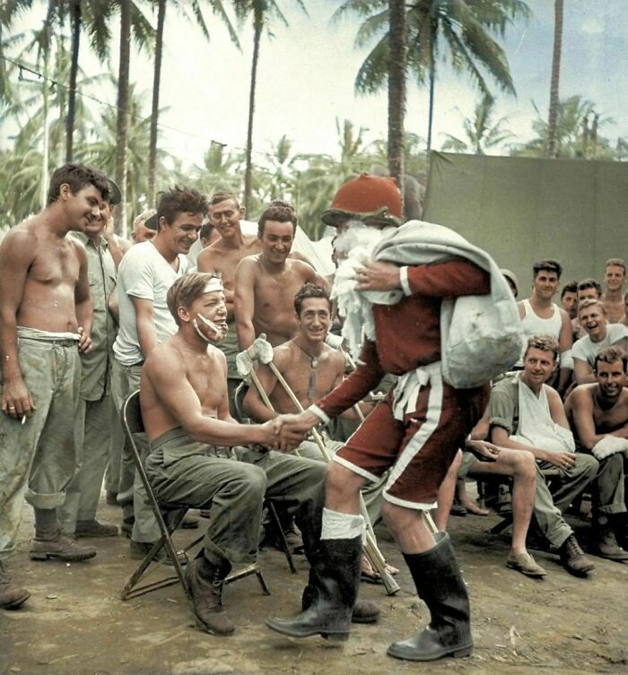 Santa Claus Handing Out Presents To Wounded American Soldiers On Christmas Day. Guadalcanal, 1944.