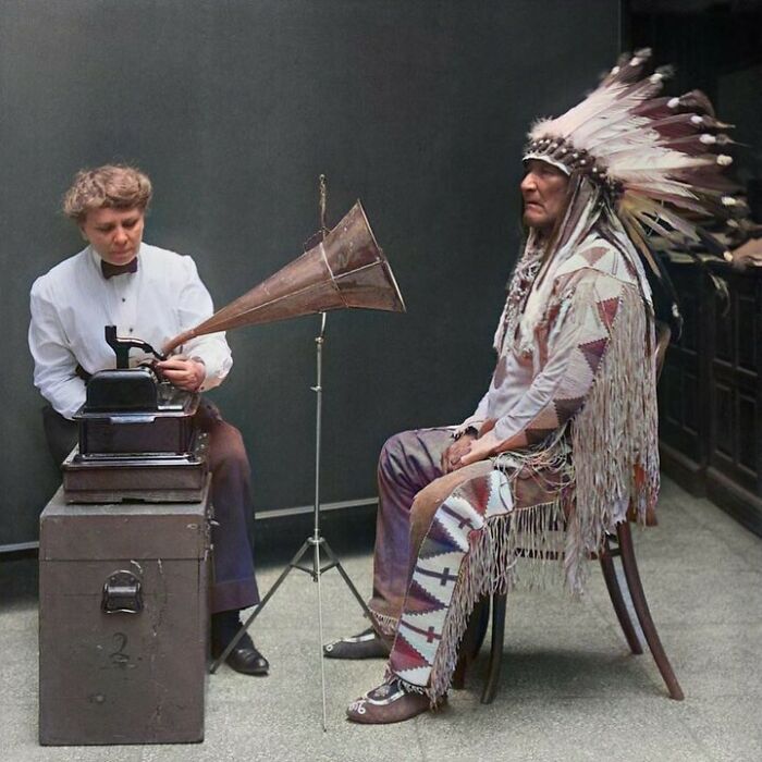 Mountain Chief Listening To A Song Being Played On A Phonograph And Interpreting It In Plains Native American Sign Language To Ethnomusicologist Frances Densmore In 1916