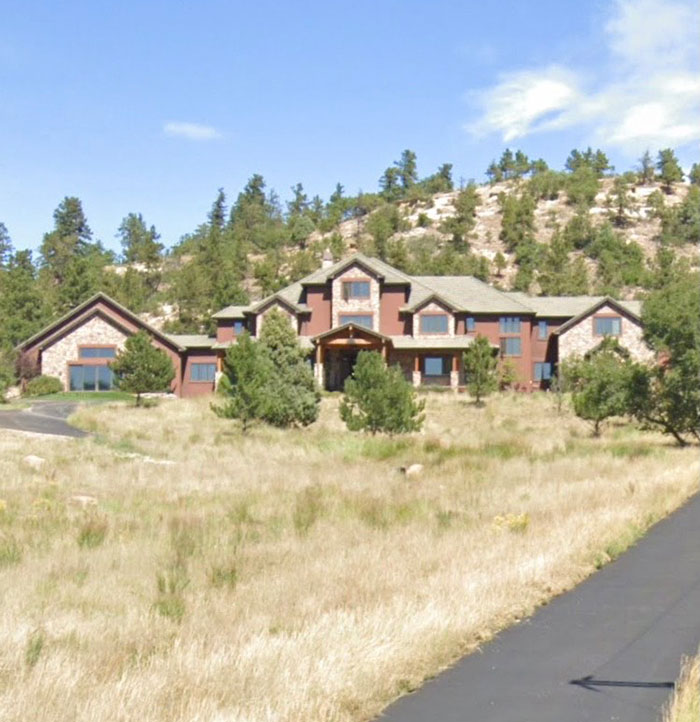 Behold, The Multi-Million Mansion In A Neighborhood With Small Houses And Horses