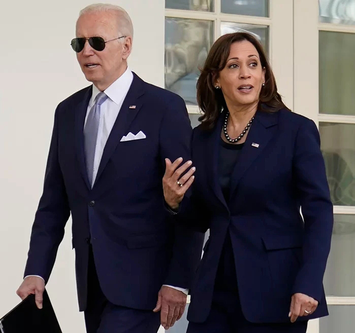 Was The VP Holding Biden's Arm?