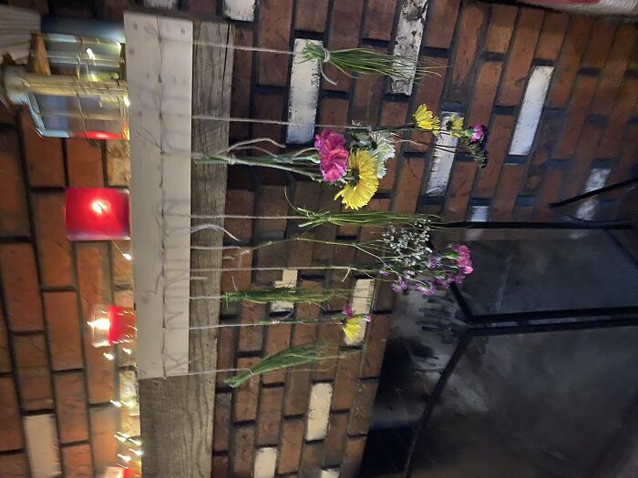 Herbs And Flowers Drying By The Fireplace
