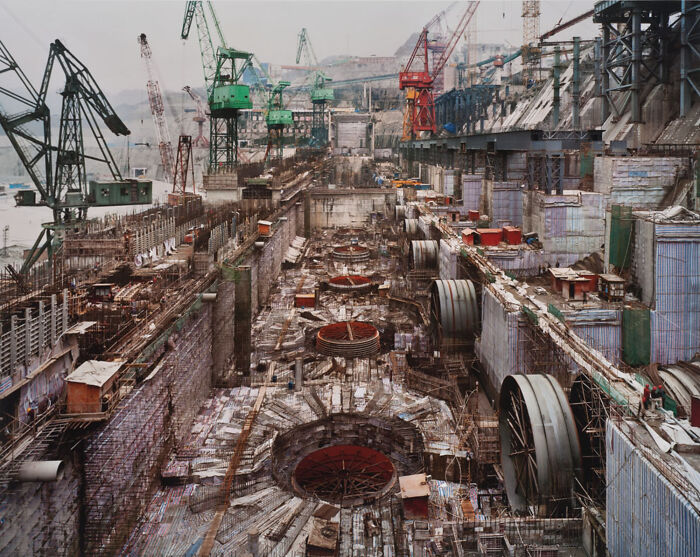 Three Gorges Dam In China Under Construction. People At Lower Right Hand Corner For Scale.
