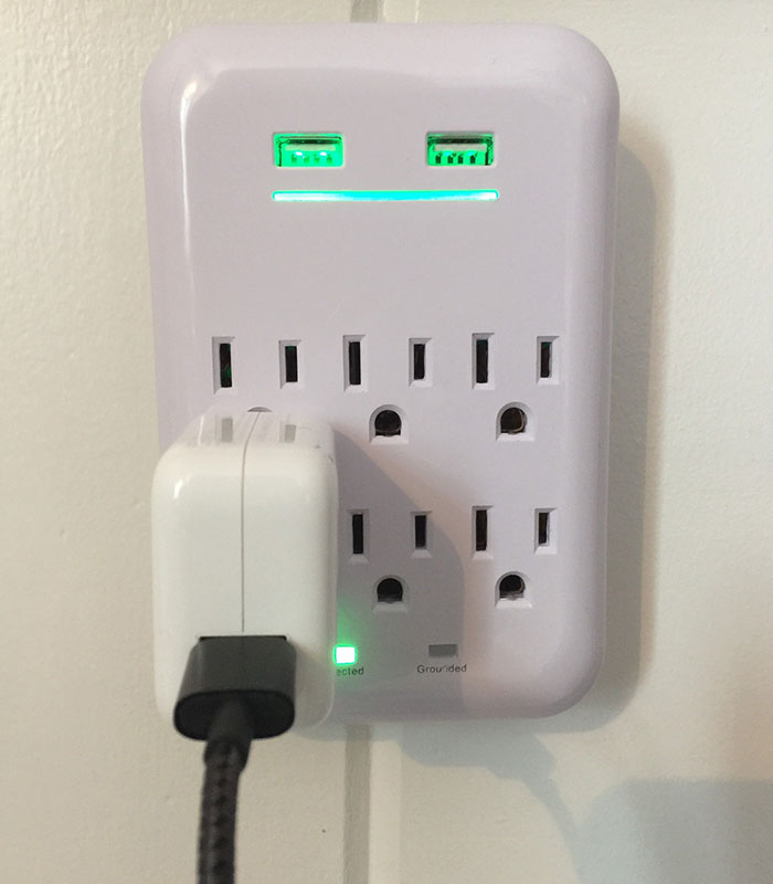 My Wife Using The New USB/Outlet Combo I Just Bought