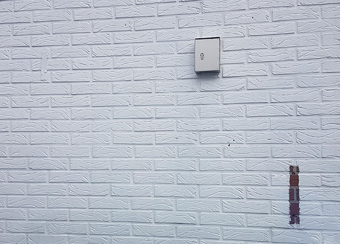 The Entire Wall Was Painted Except For One Spot