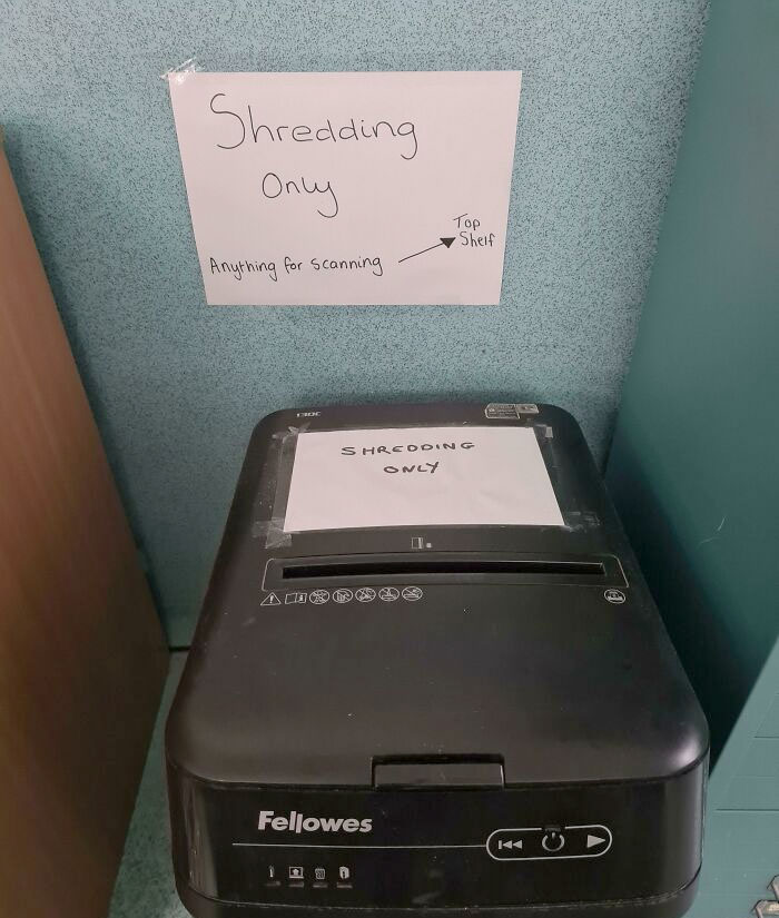 The Sign On The Shredding Machine Was Obviously Not Enough To Prevent People Putting Filing There