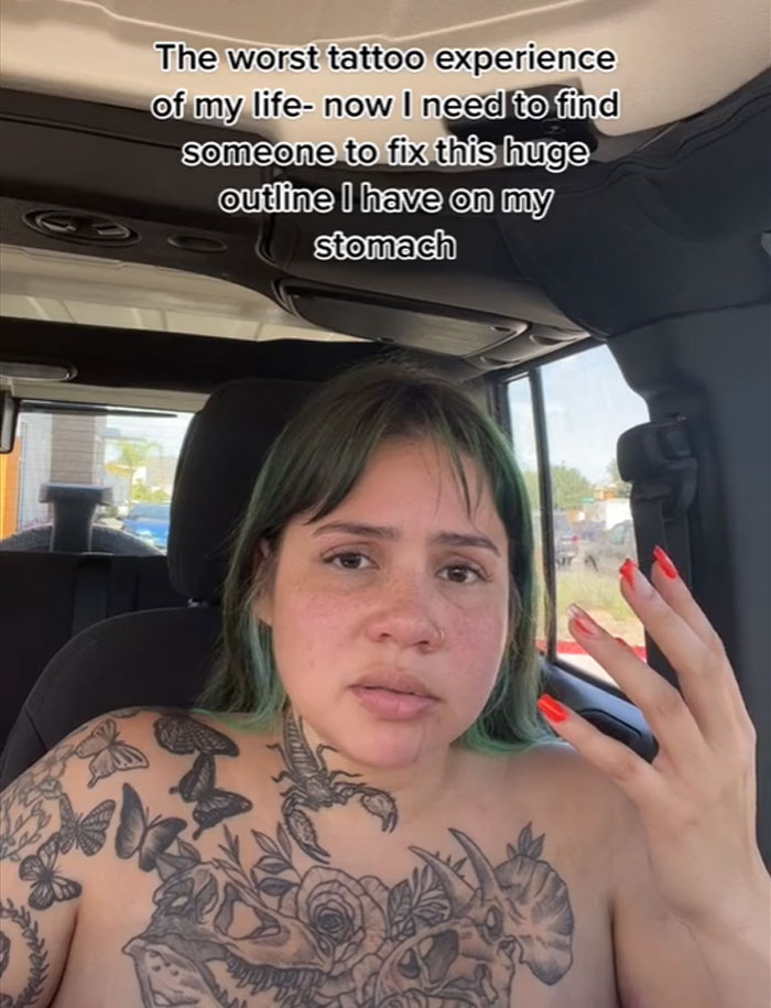 Woman with tattoos, looking upset, shares her tattoo session experience. Text overlay: "The worst tattoo experience of my life. Woman with tattoos, looking upset, shares her tattoo session experience. Text overlay: "The worst tattoo experience of my life.