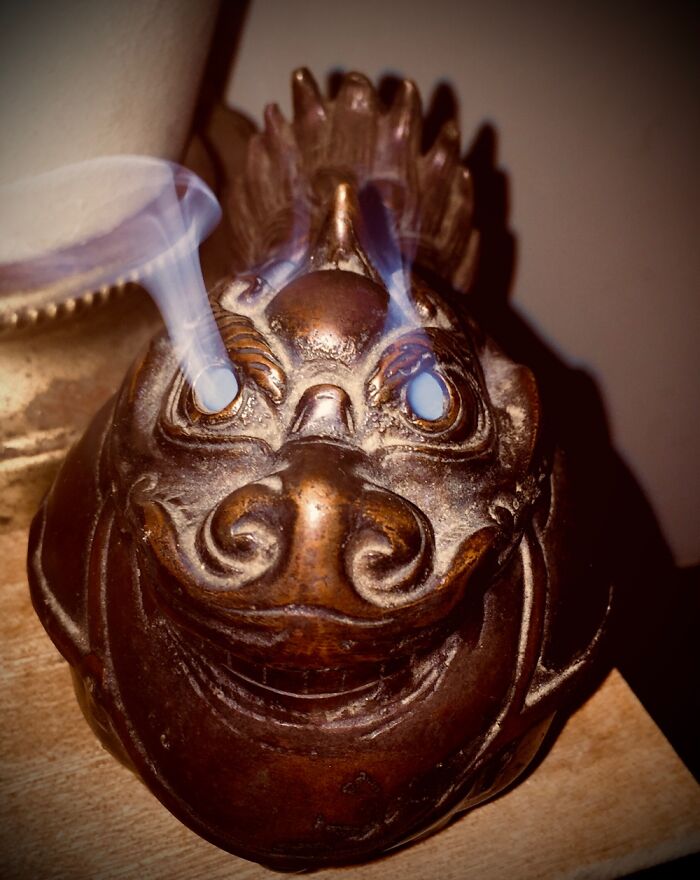 Incense Burner With Smoke Coming From The Eyes