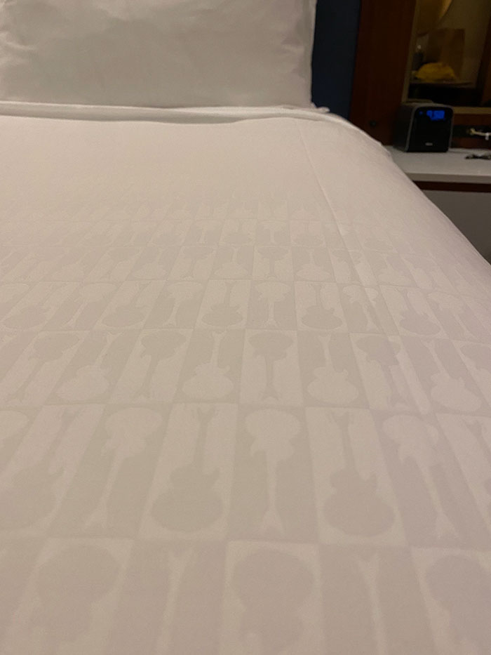 Stayed At A Hard Rock Hotel And The Comforter Had Little Guitars Barely Visible