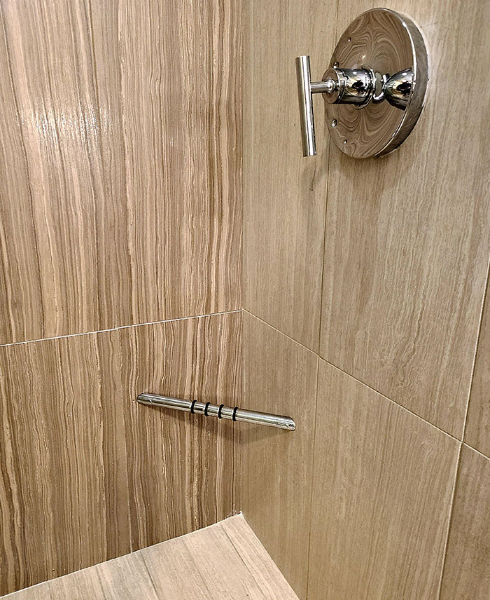 My Hotel Room Shower Has A Foot Rest