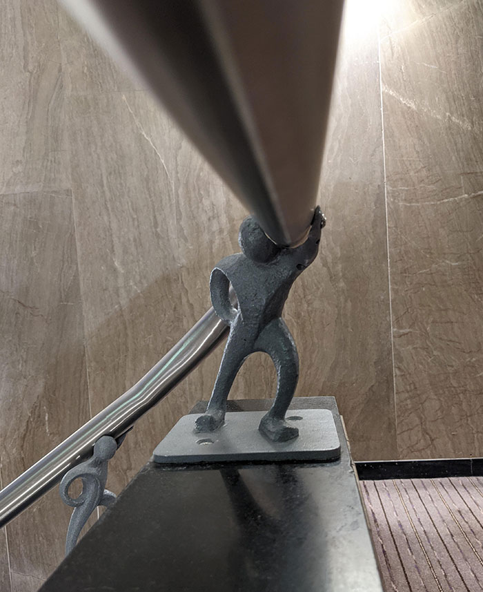 The Banisters At My Hotel Were Held Up By Little Metal Men