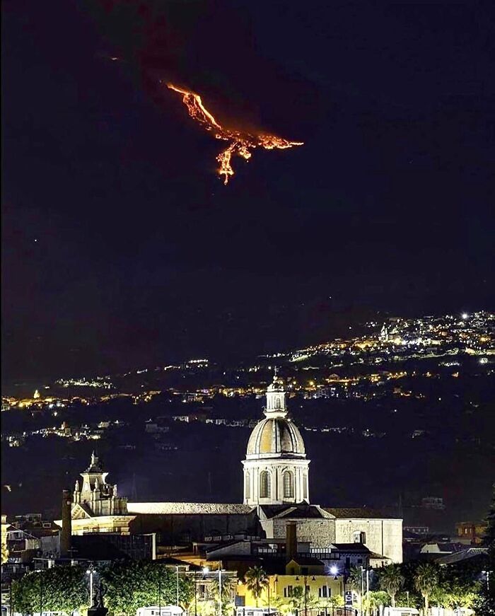 Eruption On Mount Etna (Sicily) Gives The Illusion Of A Phoenix In The Sky