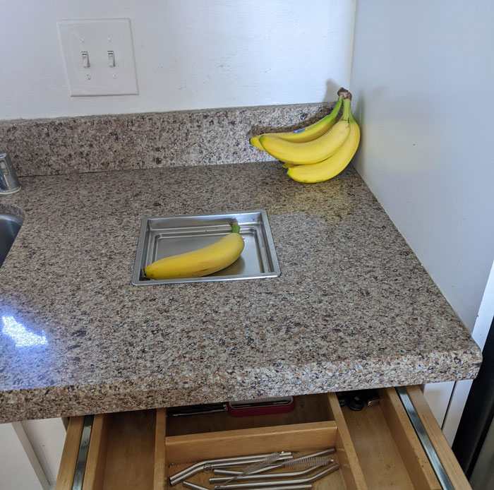 Staying At An Airbnb And We Have This Little Metal Tray Embedded In The Counter Top. It's About An Inch Deep (Banana For Scale), Cannot Be Removed, And Has A Drawer Underneath