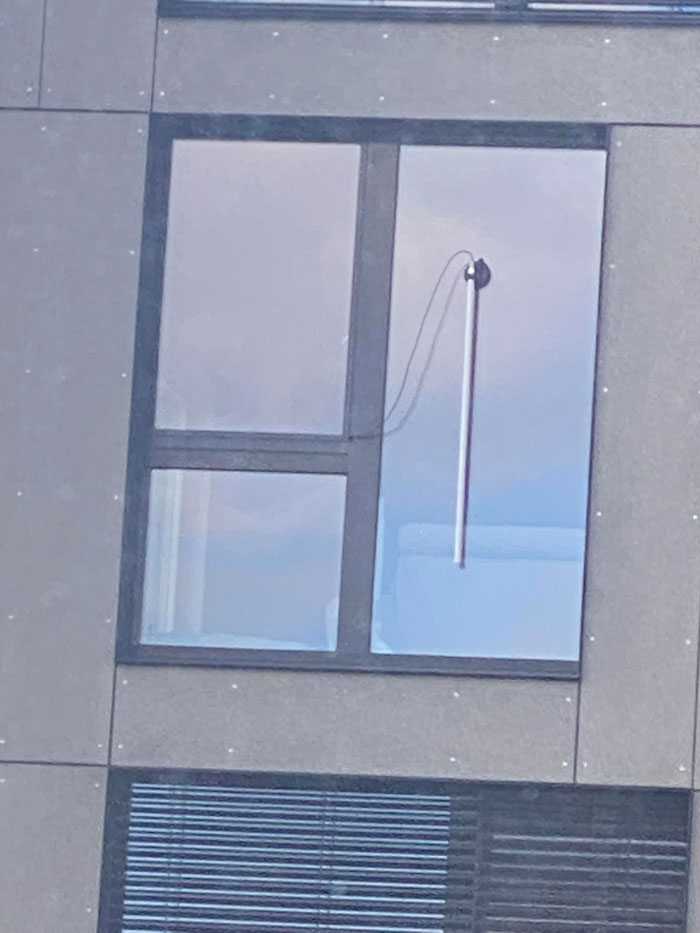 My Neighbor Just Installed This Outside Of Their Window. I Assume It Measures Something But I Have Never Seen Such A Pole